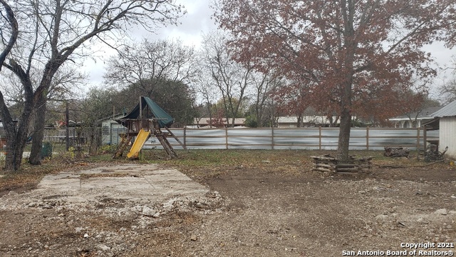 a view of a park with swings