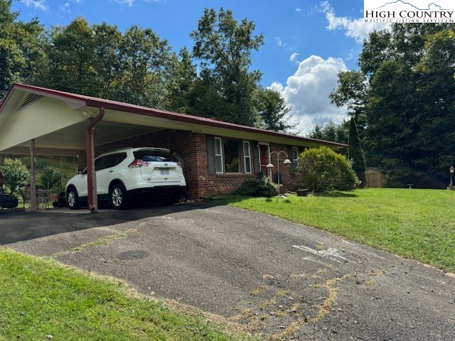 a car parked in front of a house