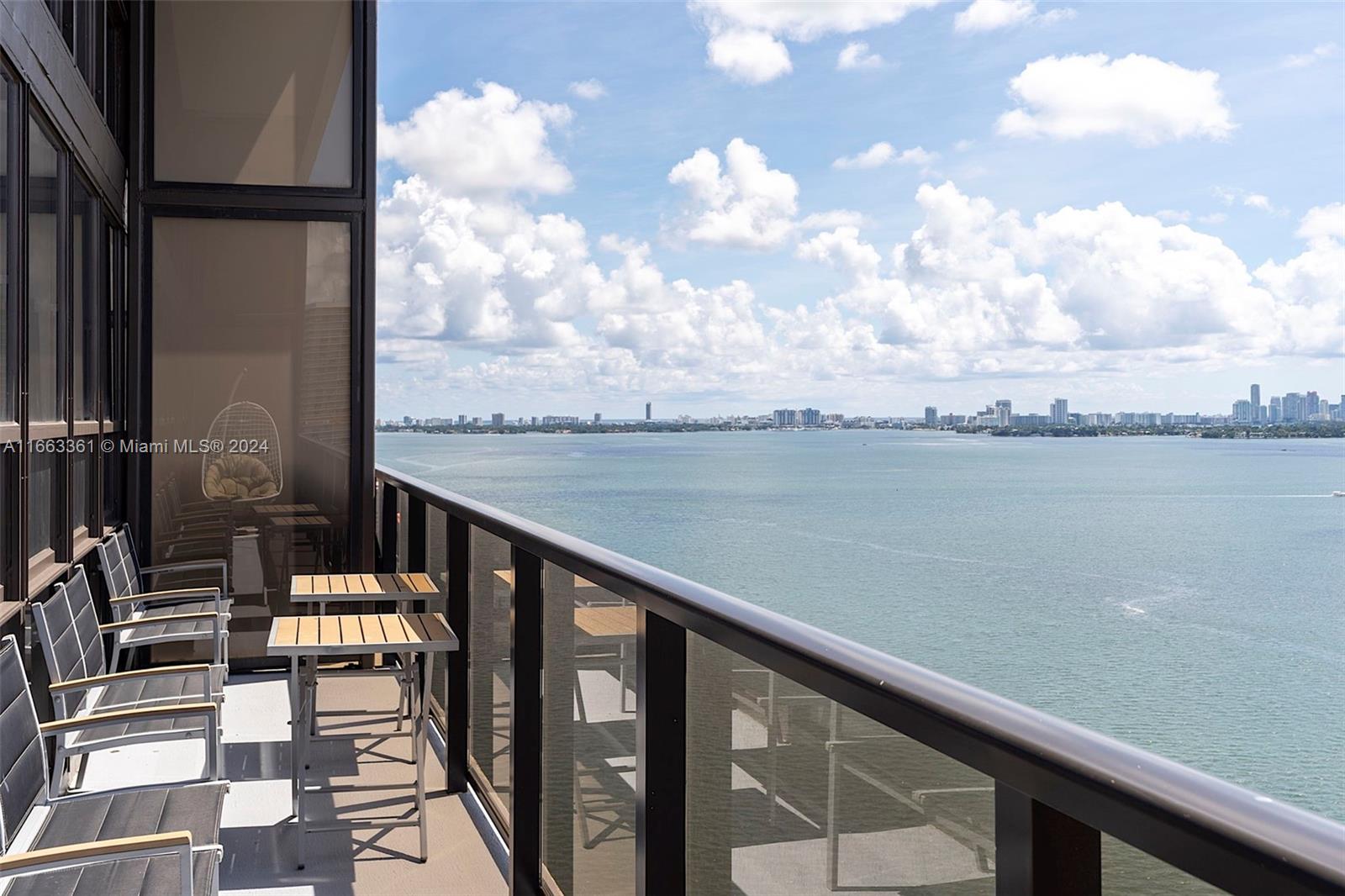 a view of balcony with furniture