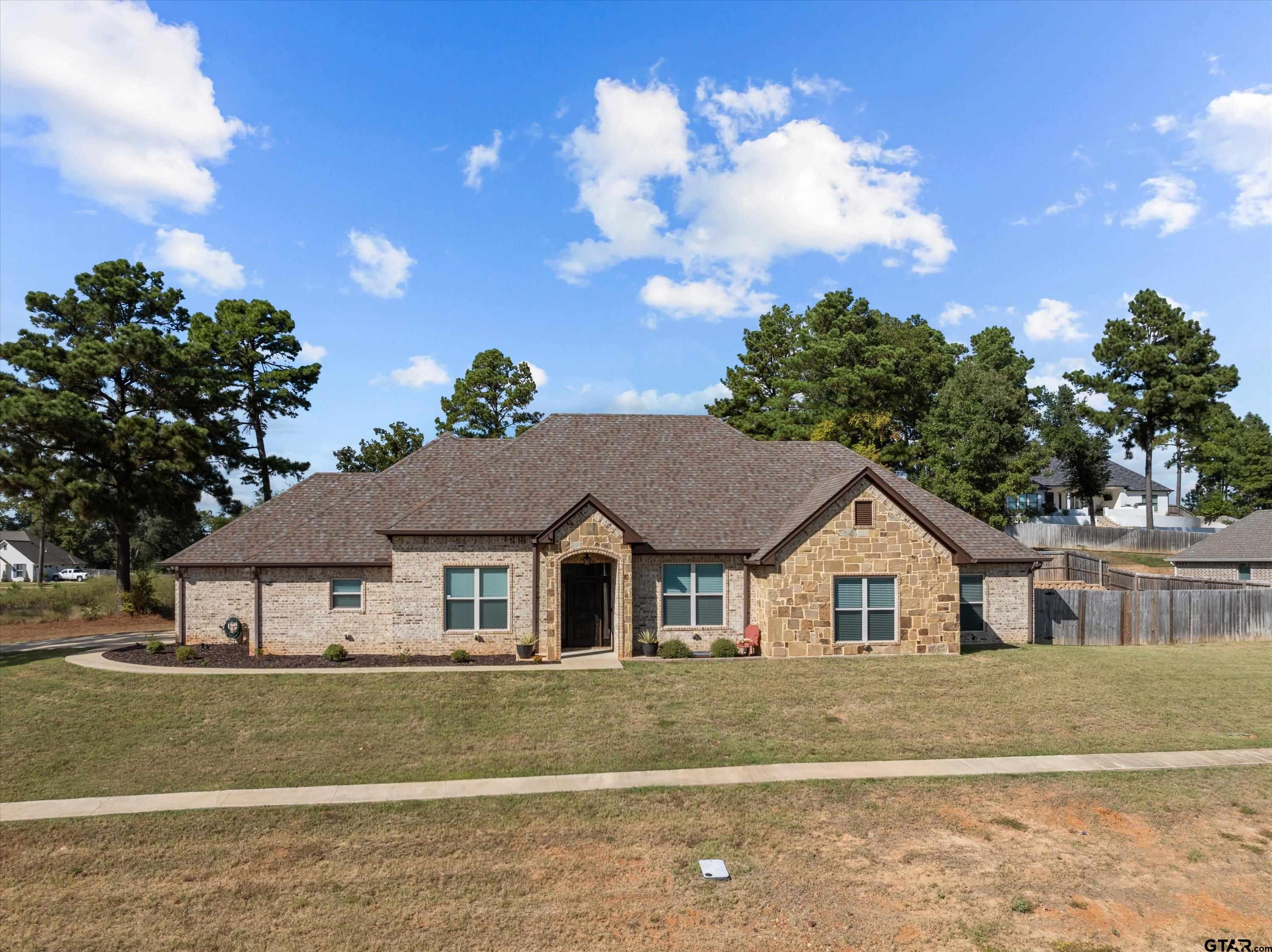 a view of house with outdoor space