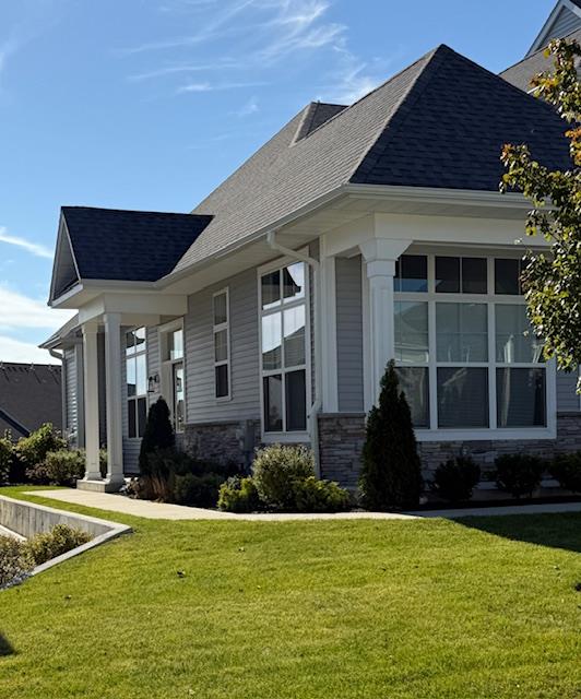 View of front of home with a front lawn