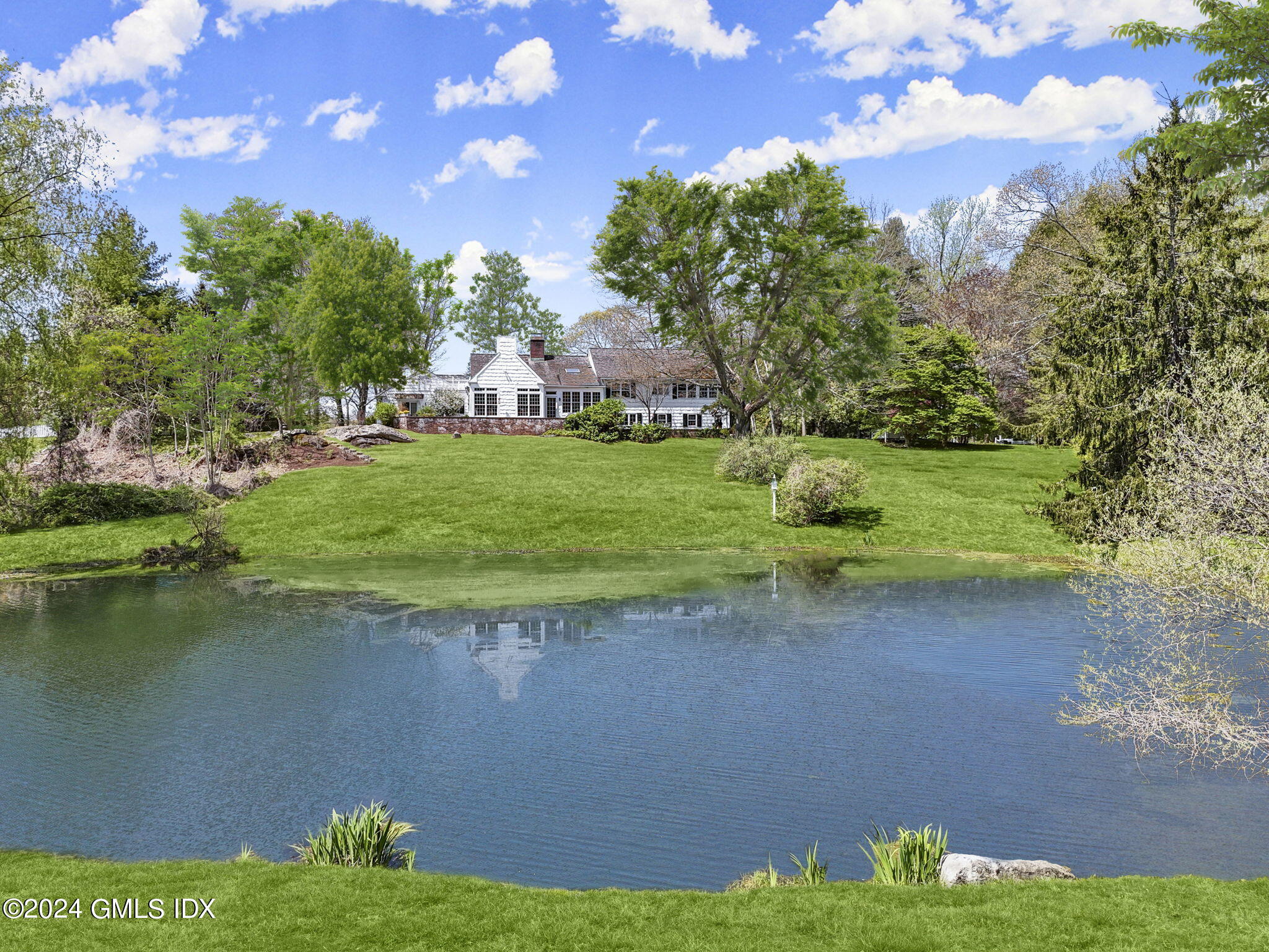 a view of a lake from a yard