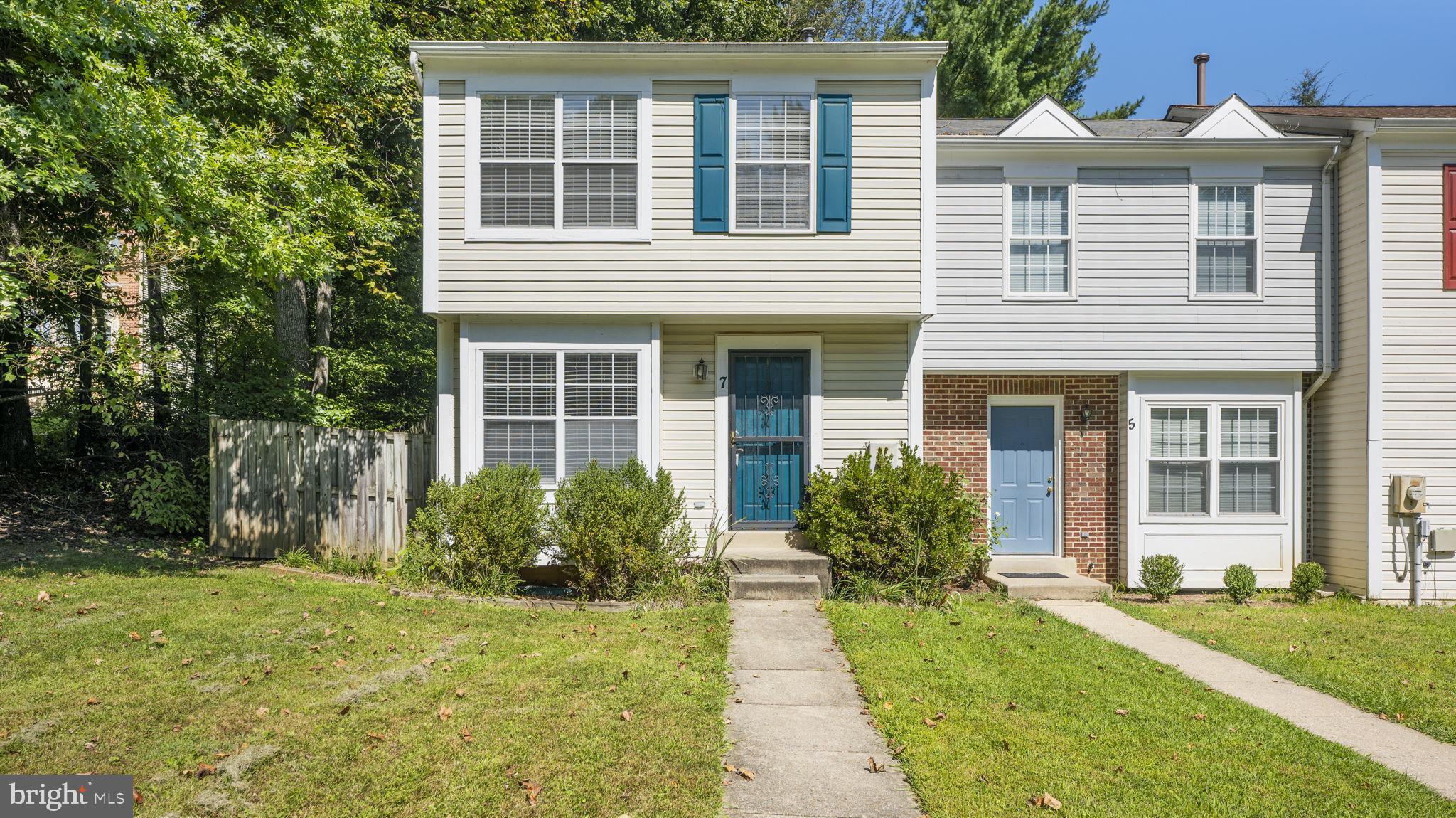 End unit townhome with green space in front!