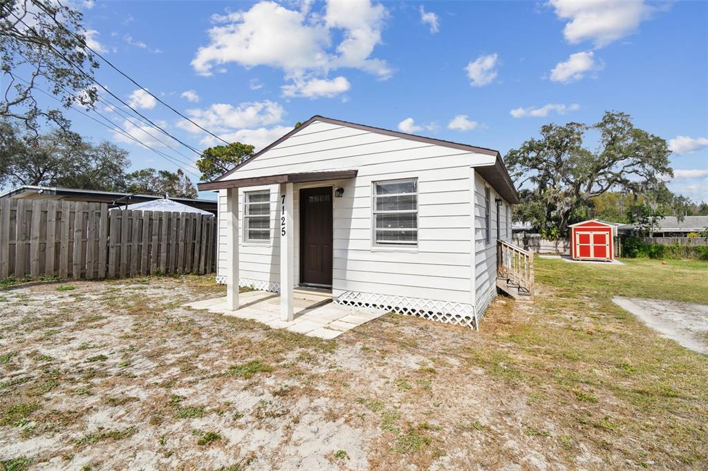 a front view of a house with a garage