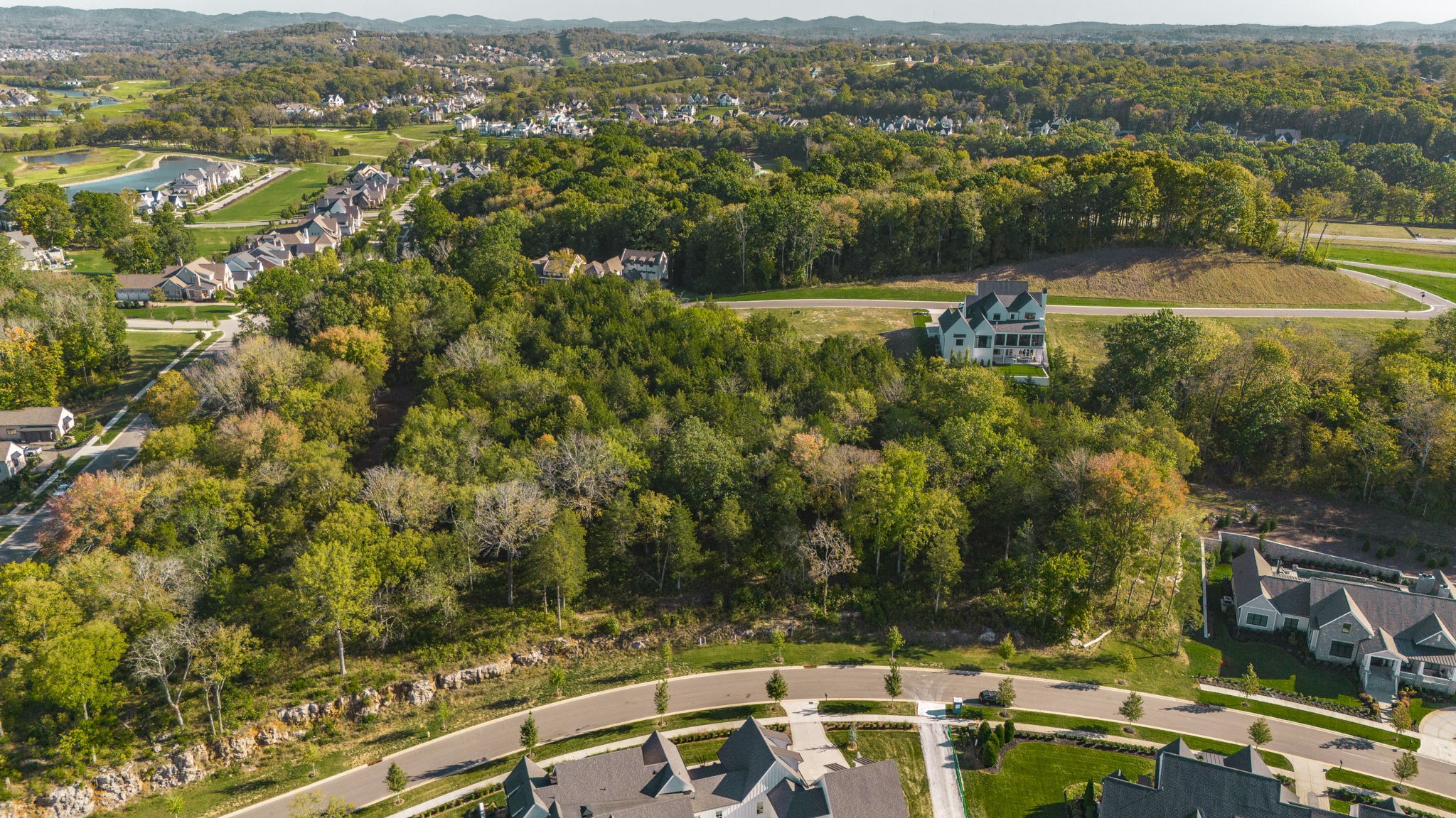 an aerial view of residential house with outdoor space