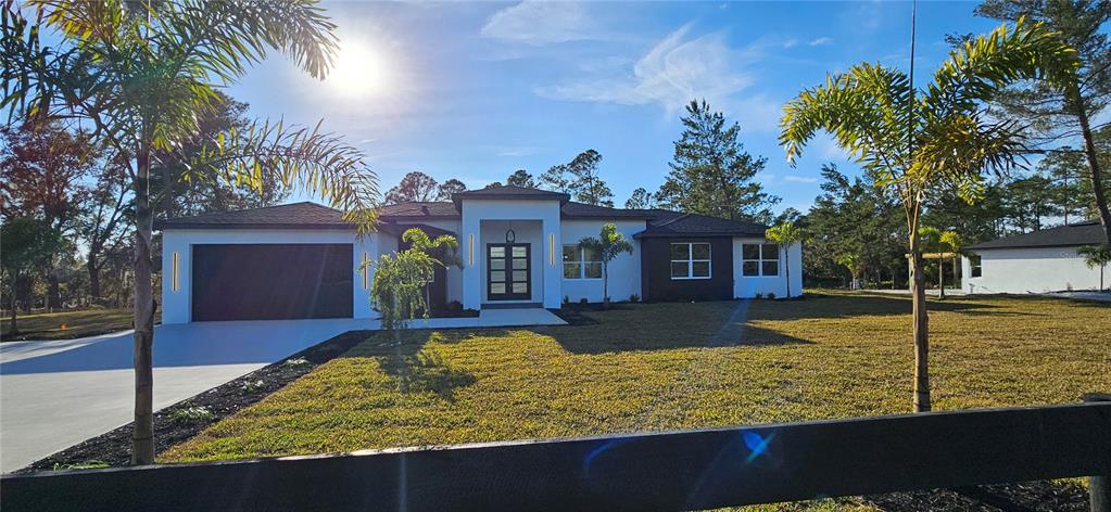 a view of a house with swimming pool