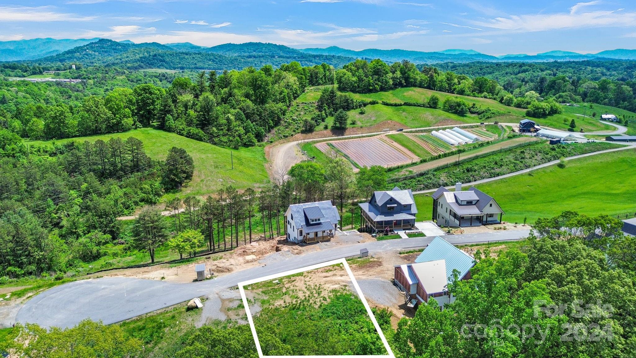 an aerial view of a house with a garden