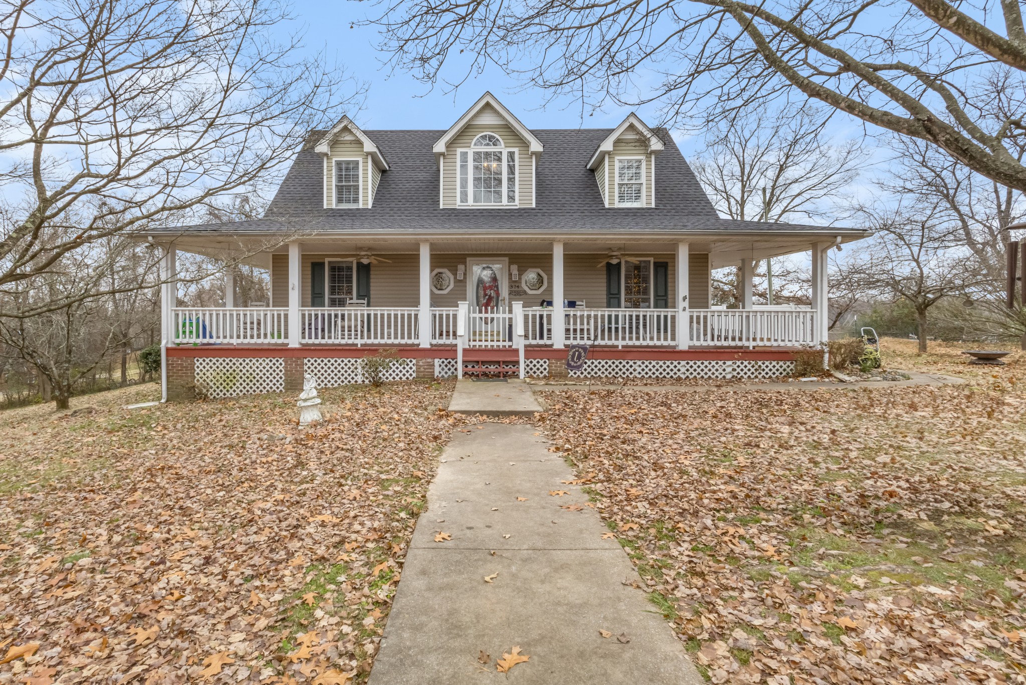 front view of a house with a yard