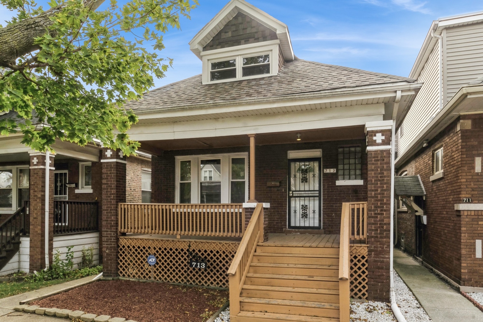 a front view of a house with a porch