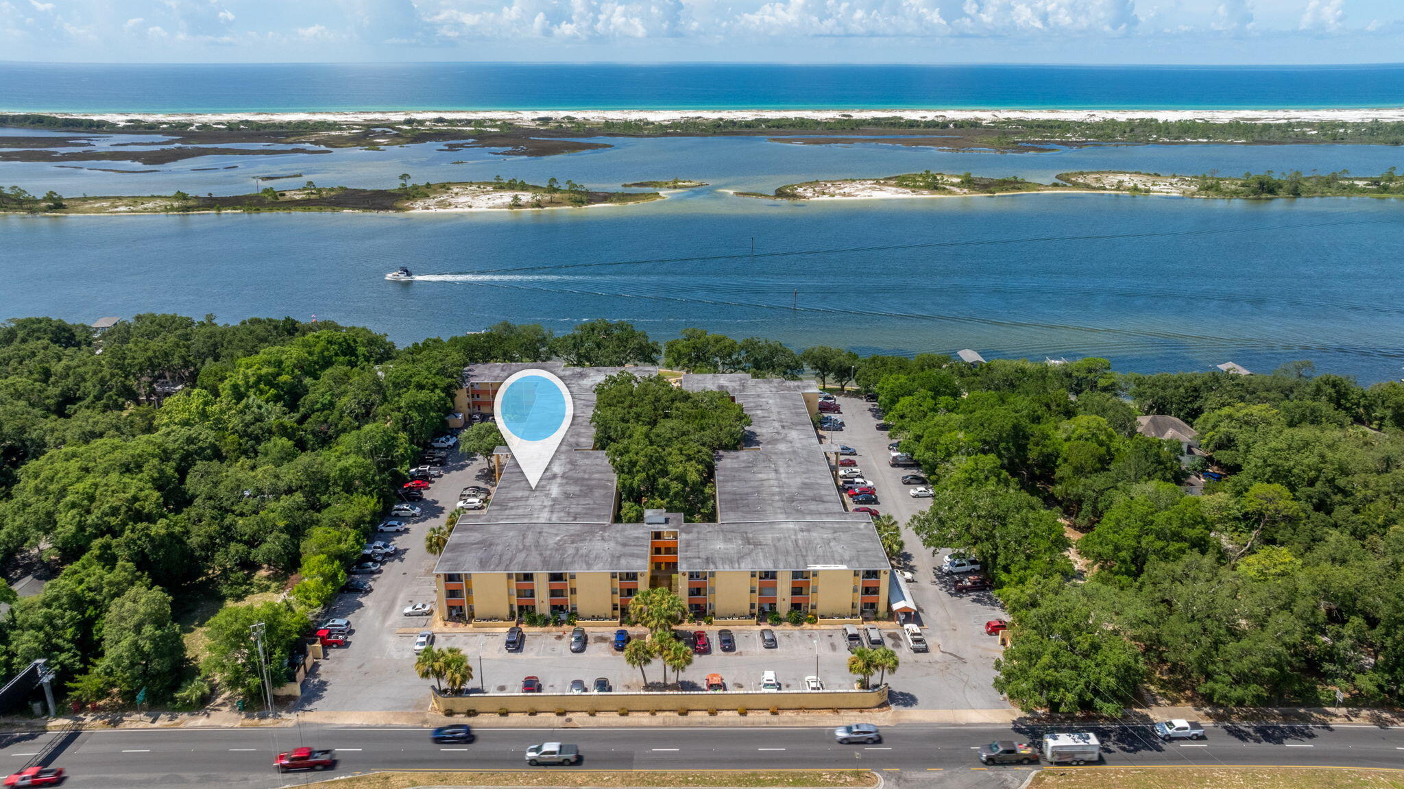 an aerial view of a house with a lake view