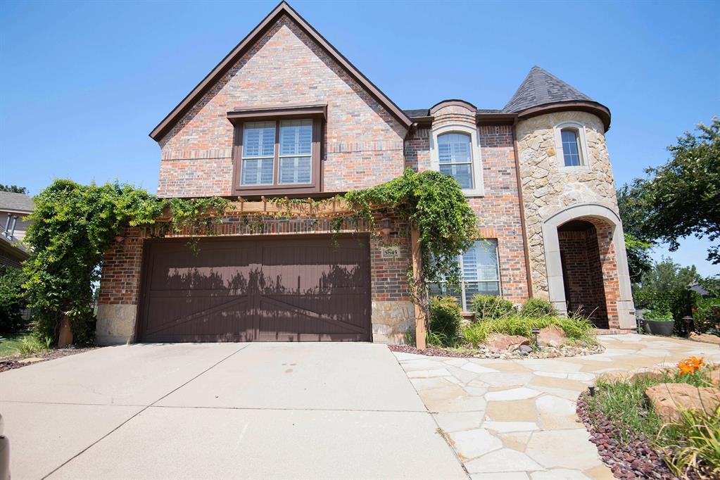 a front view of a house with yard