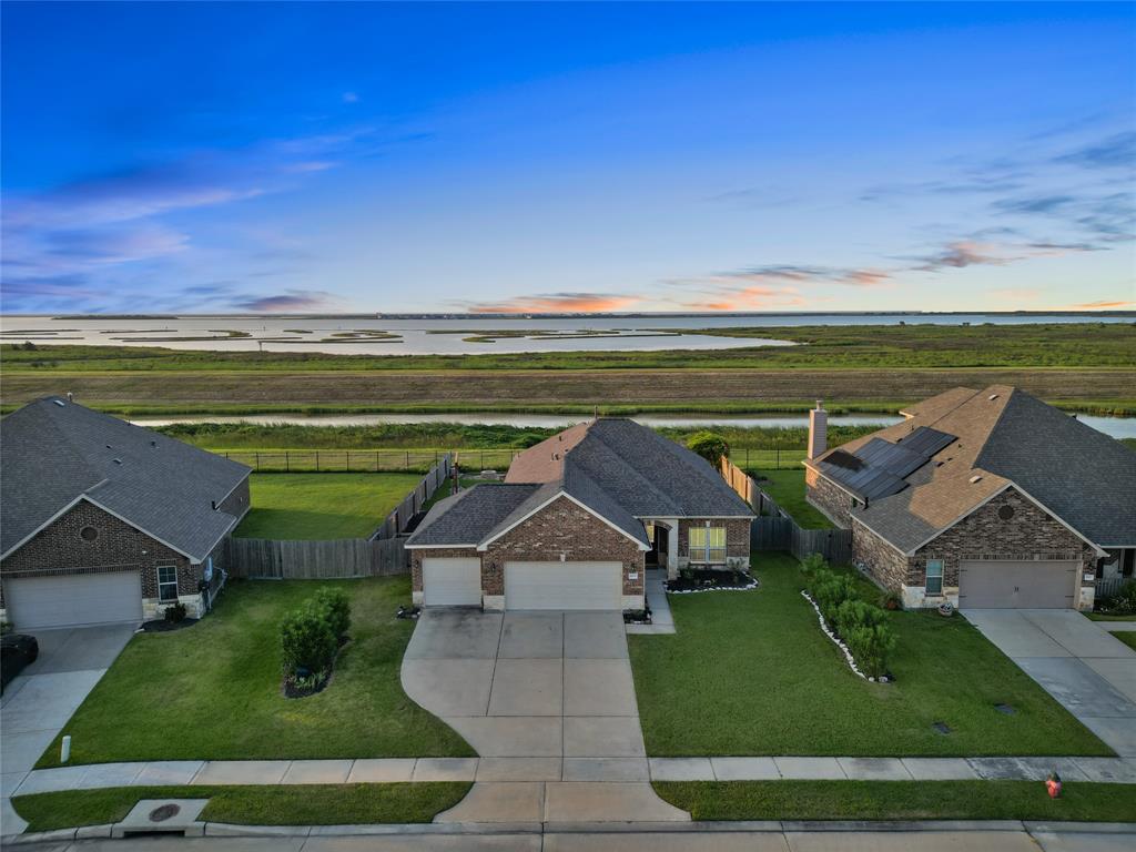 an aerial view of a house with a garden