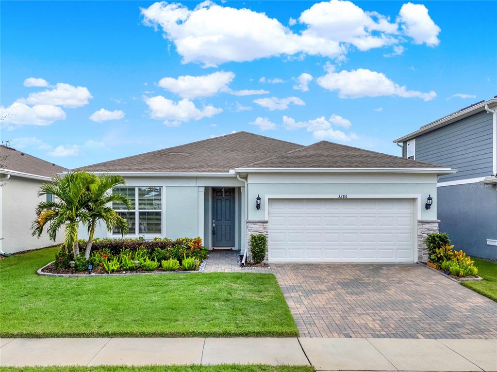 a front view of house with yard