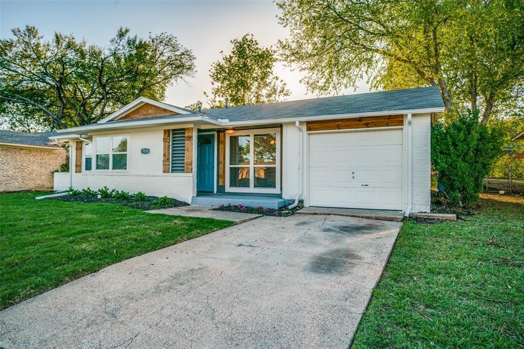 front view of a house and a yard