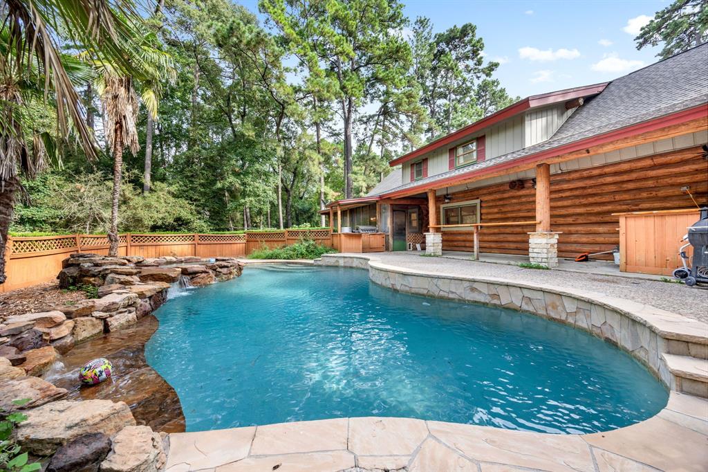 a view of a house with swimming pool