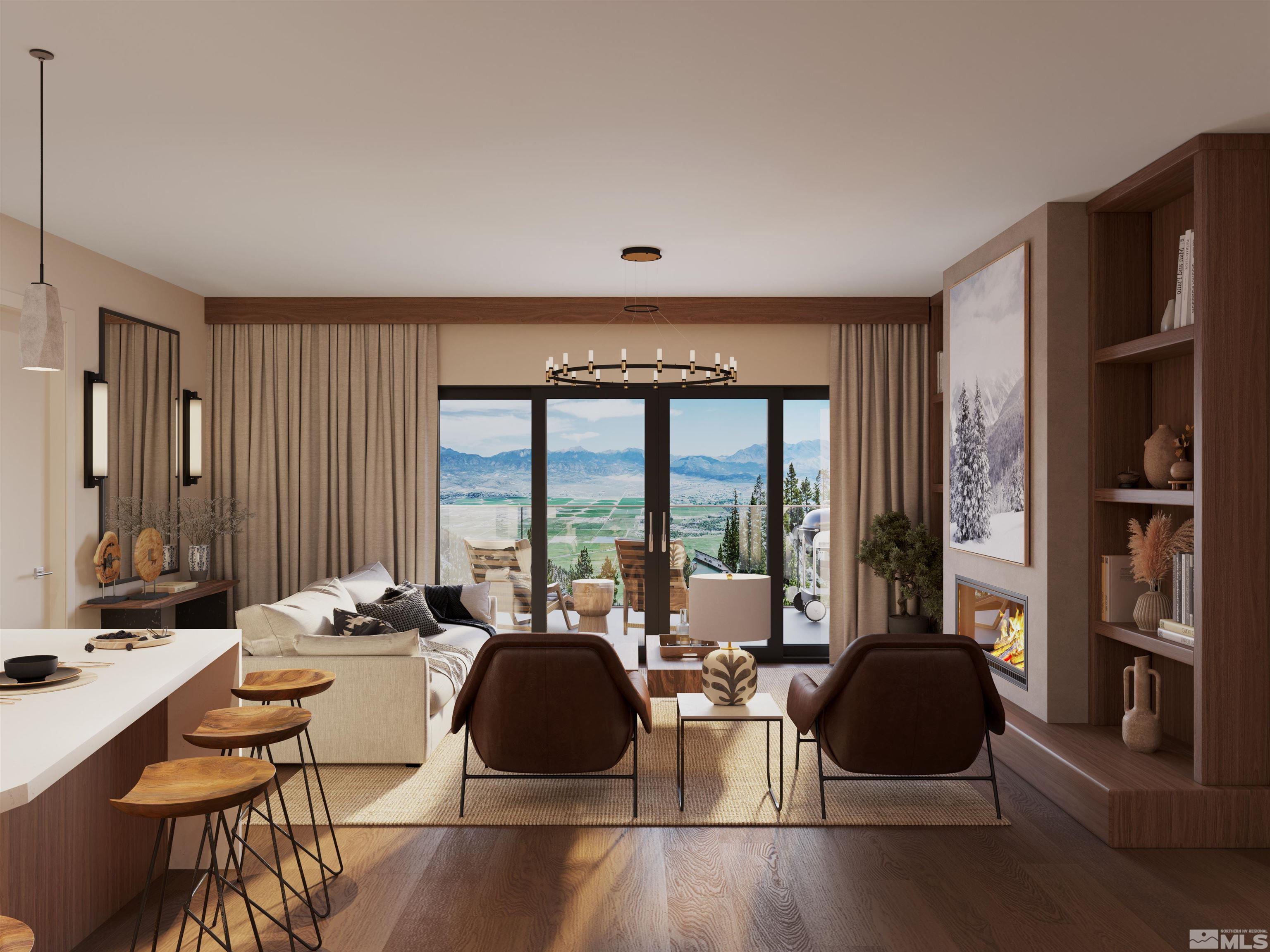 a living room with furniture a large window and a dining table