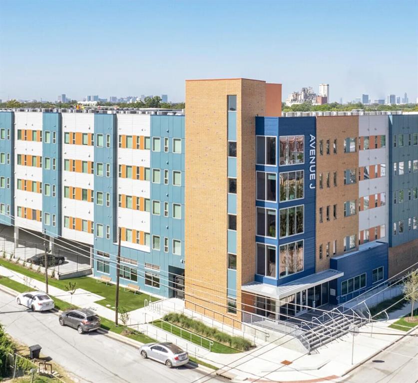 a front view of a building with street view