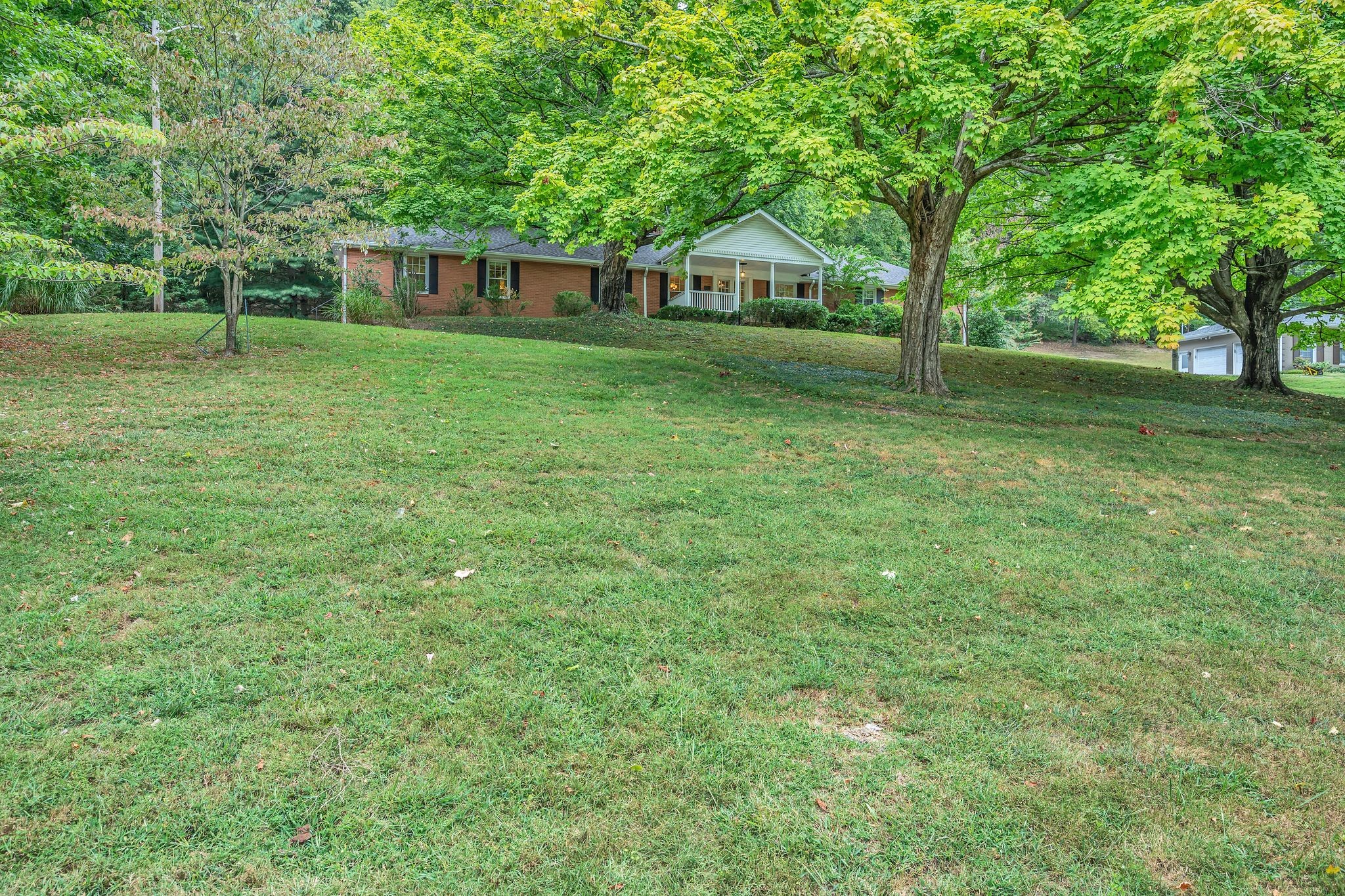 Welcome to this charming all-brick home located at 6620 Ellesmere Rd!