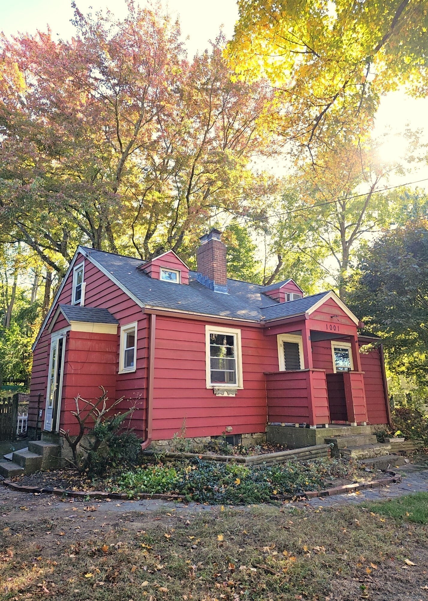 a front view of a house with yard