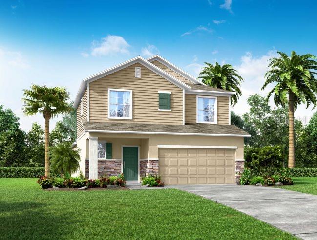 a front view of a house with a garden and plants