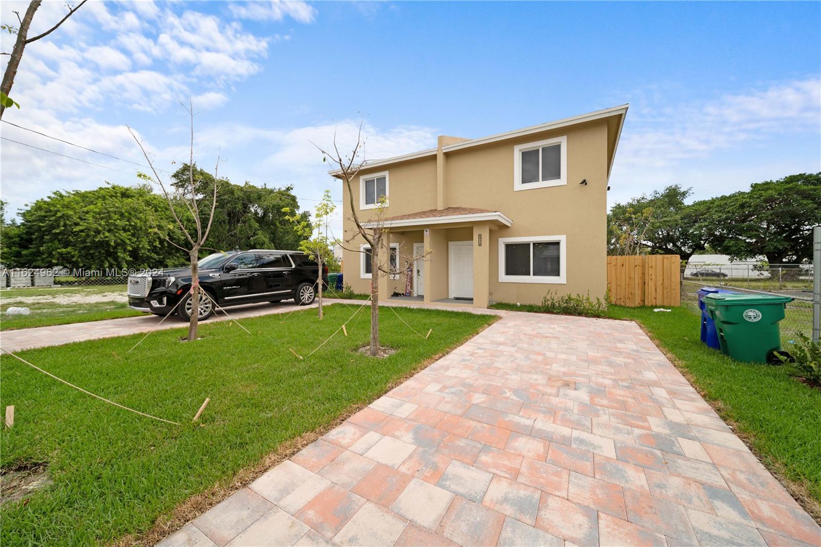 a house view with a garden space