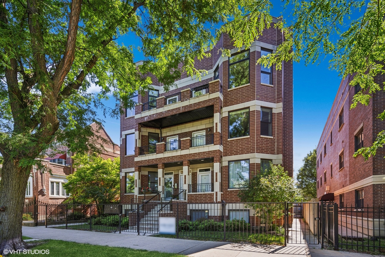 a front view of a multi story residential apartment buildings