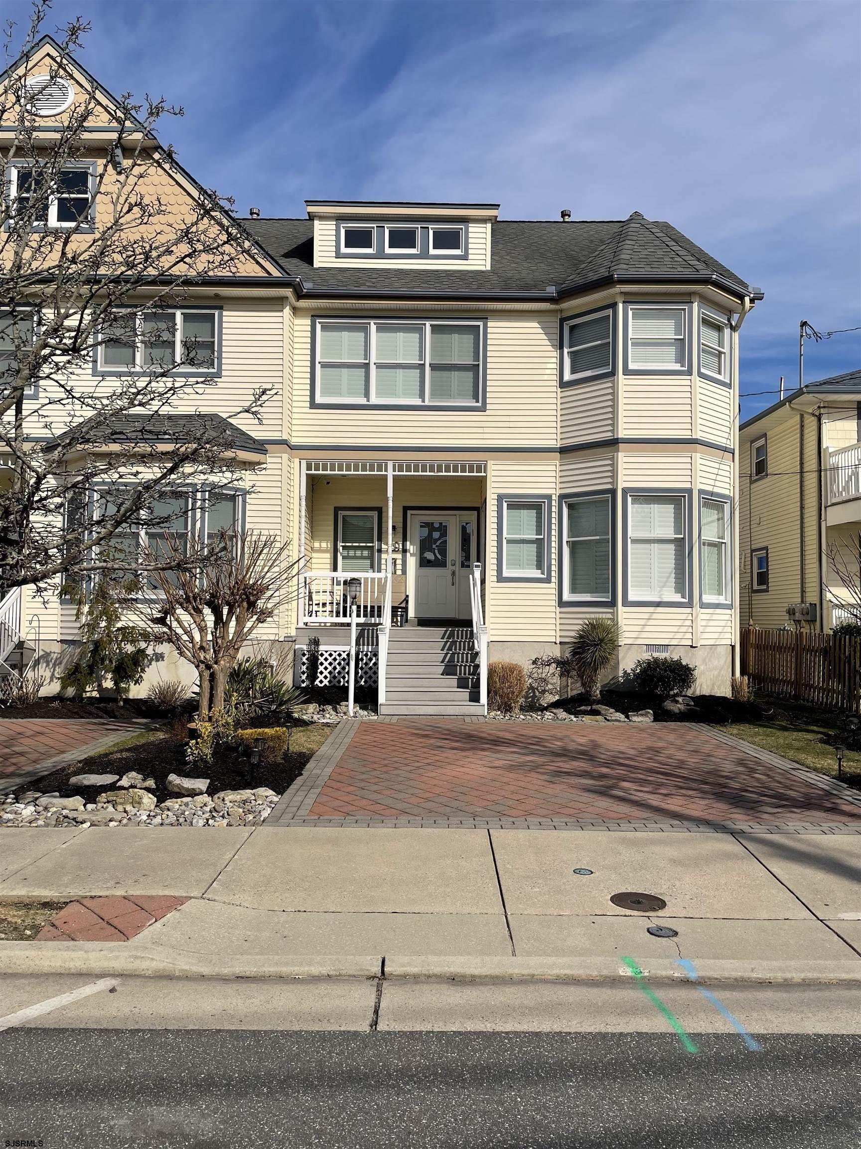 front view of a house with a patio