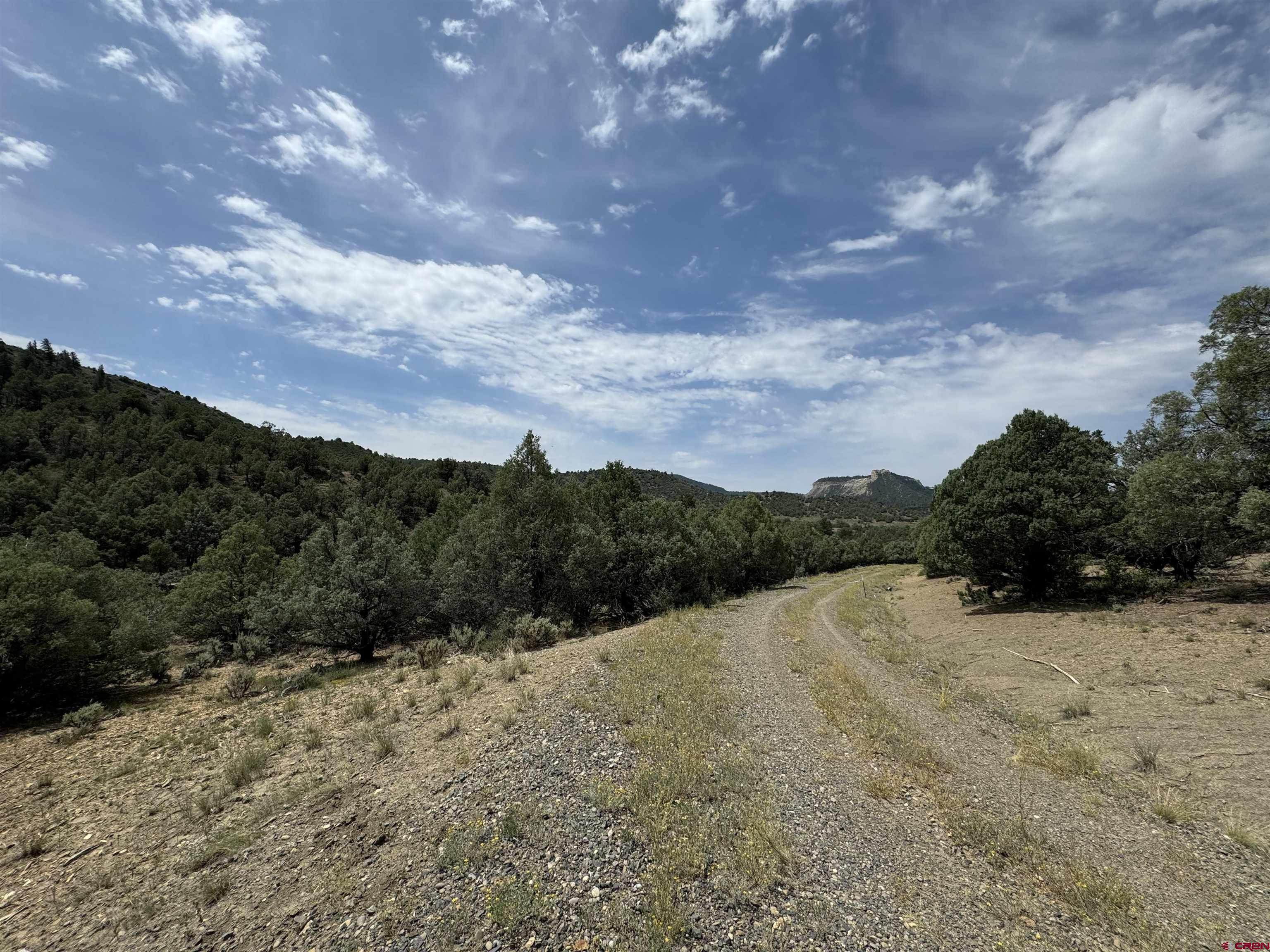 a view of mountain view with mountains in the background