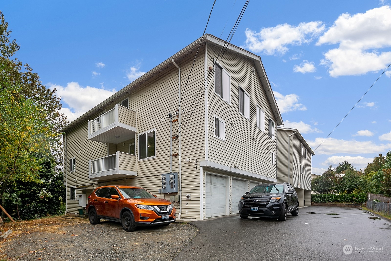 a car parked in front of a house