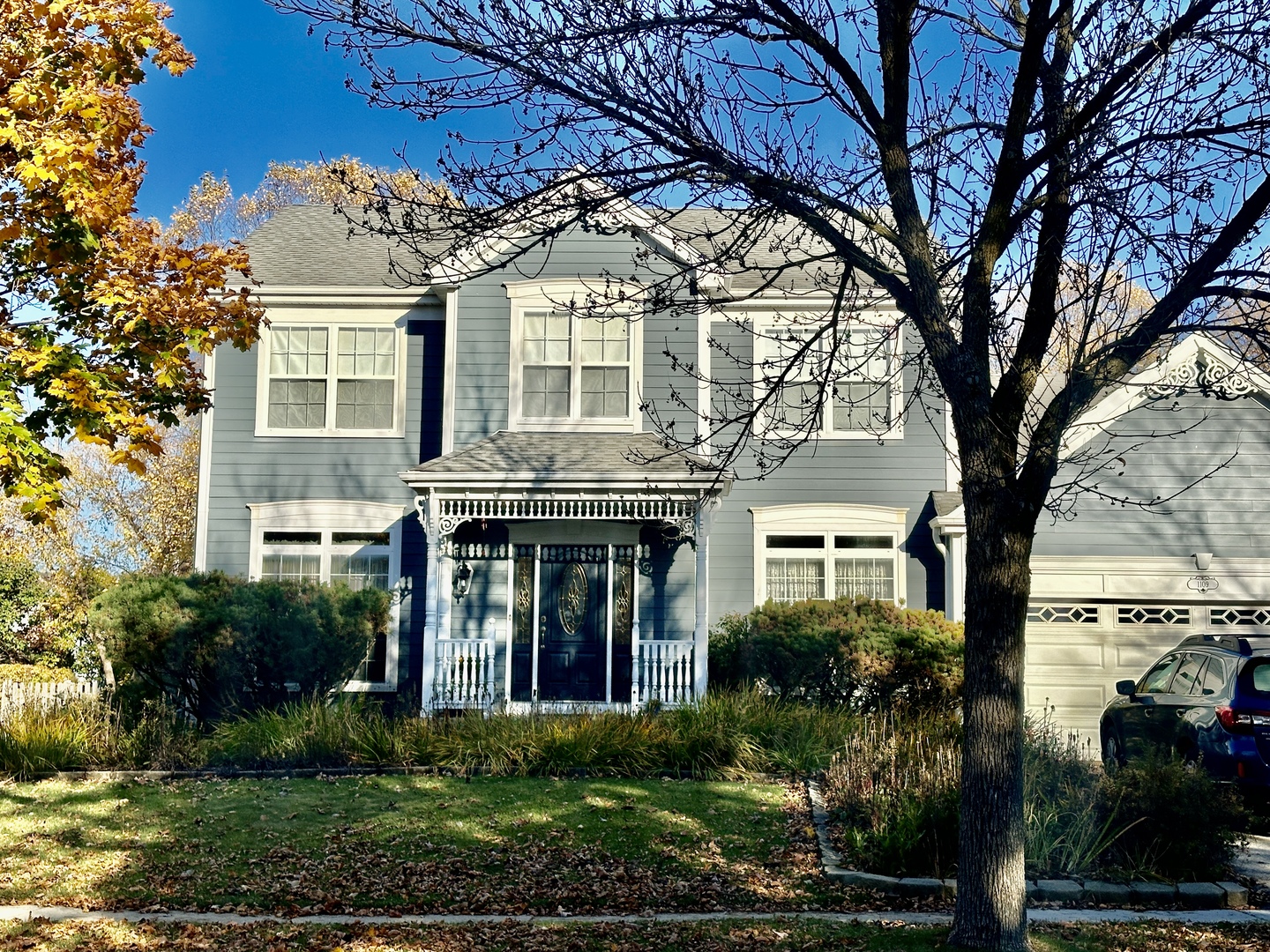 front view of a house with a garden