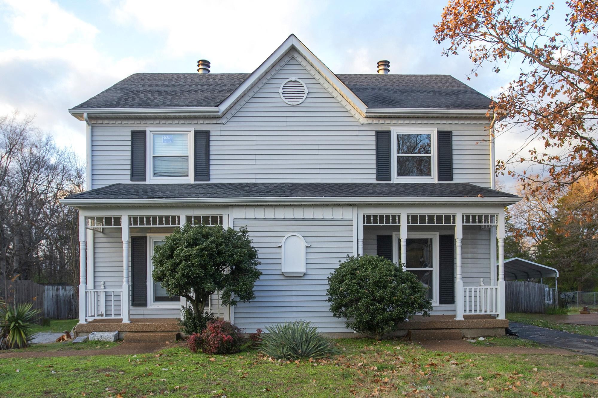 front view of a house with a yard