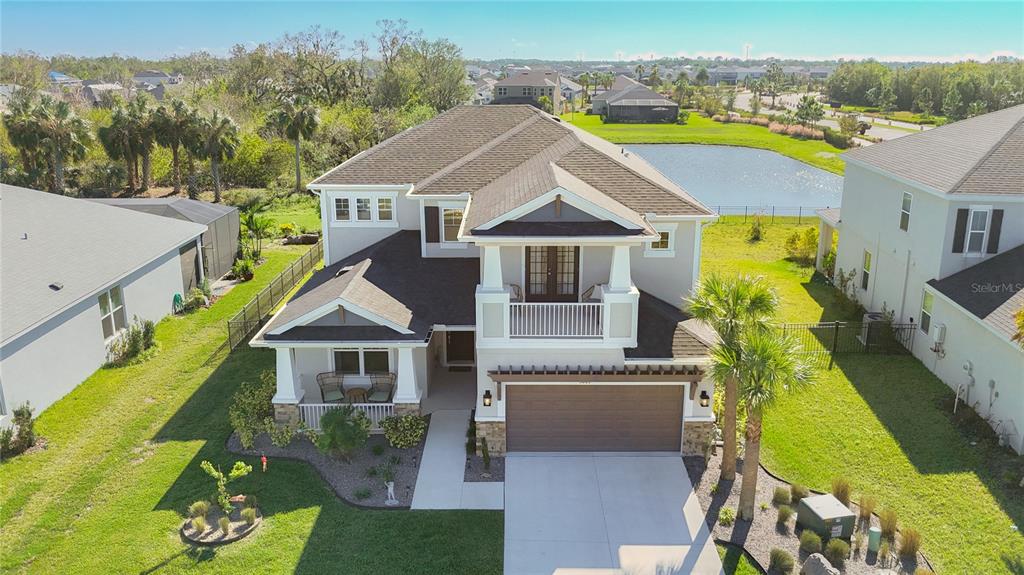 a aerial view of house with a swimming pool