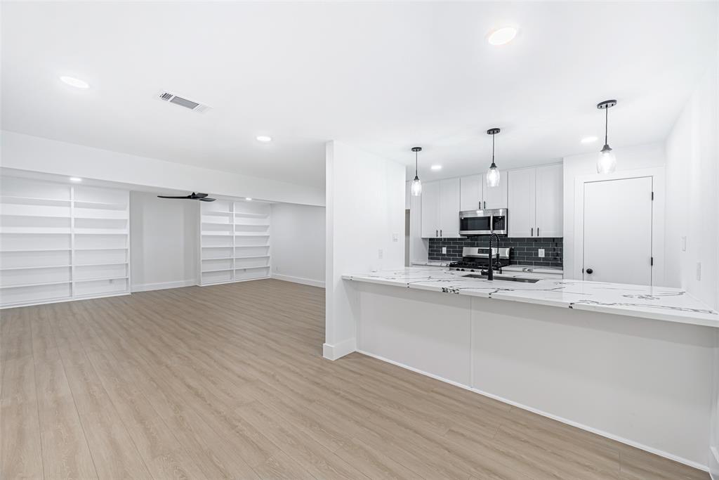 a view of kitchen and sink