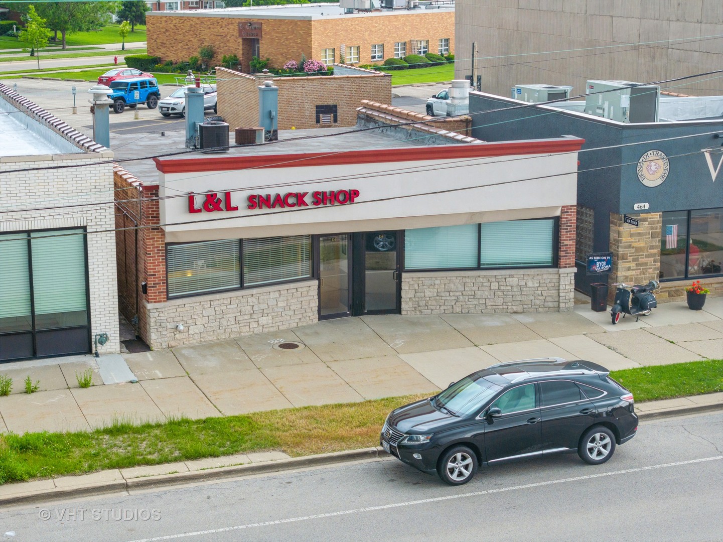 a car parked in front of a building