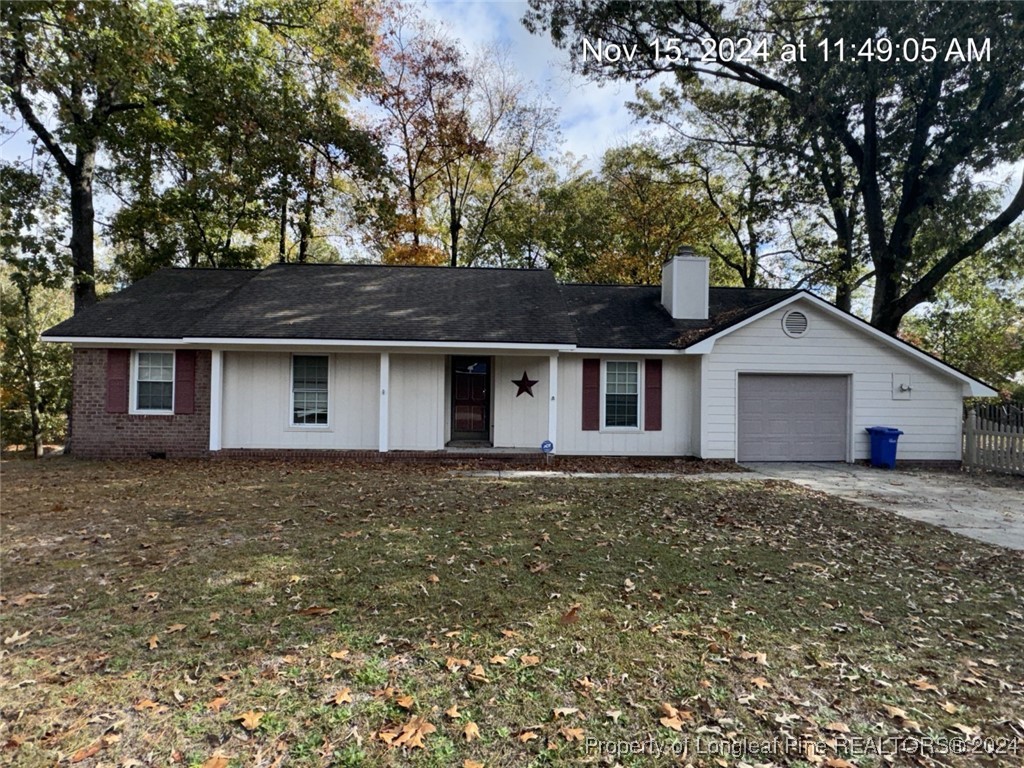 front view of house with a yard