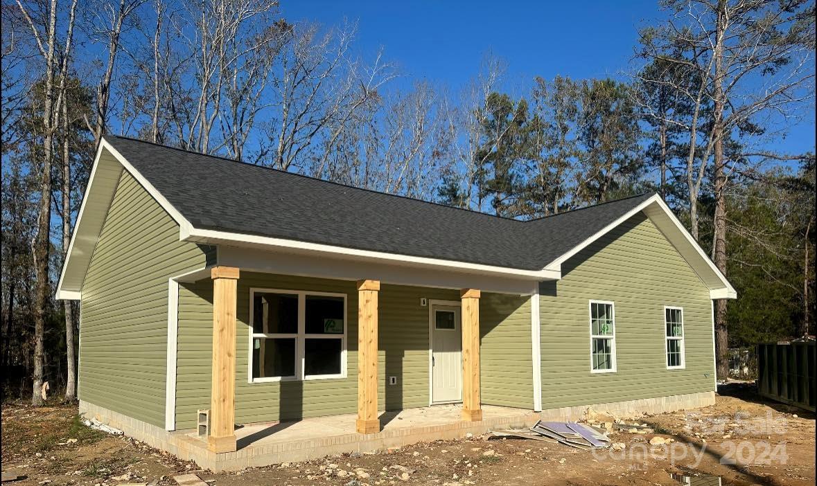 a view of a house with a garage