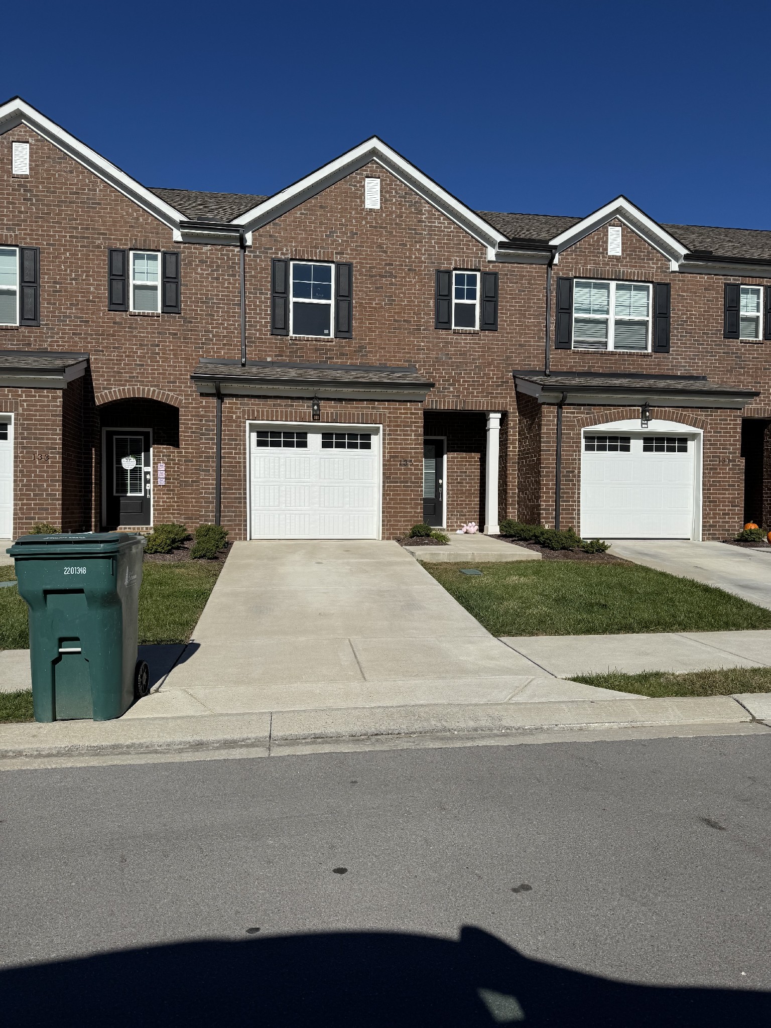 a front view of a house with yard