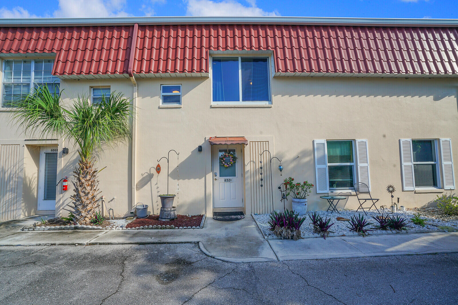 a front view of a house with a garage