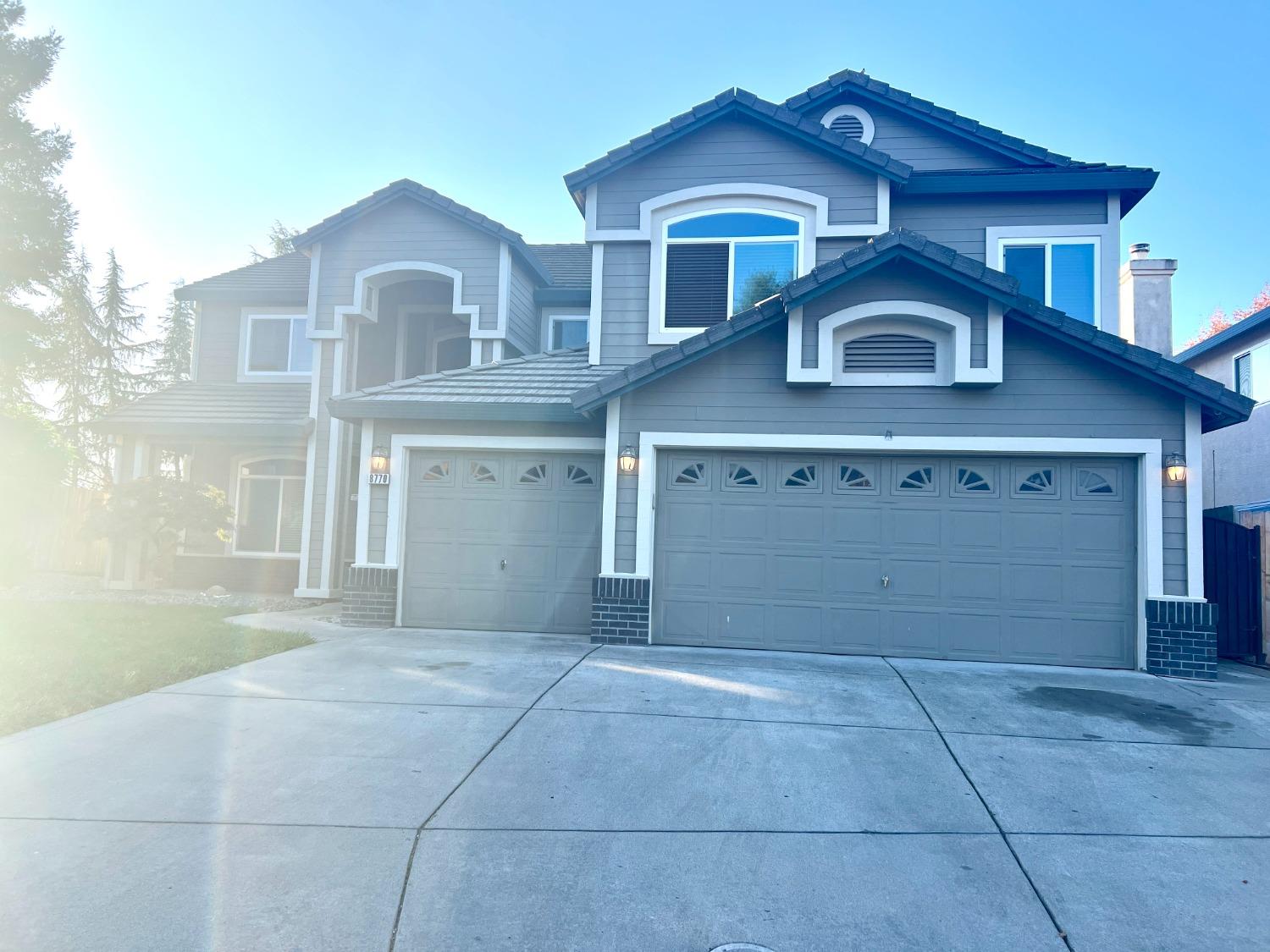 a view of a house with a garage