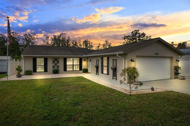 Homes for Sale with a Garage in Venetian Village, Tavares, FL | Compass