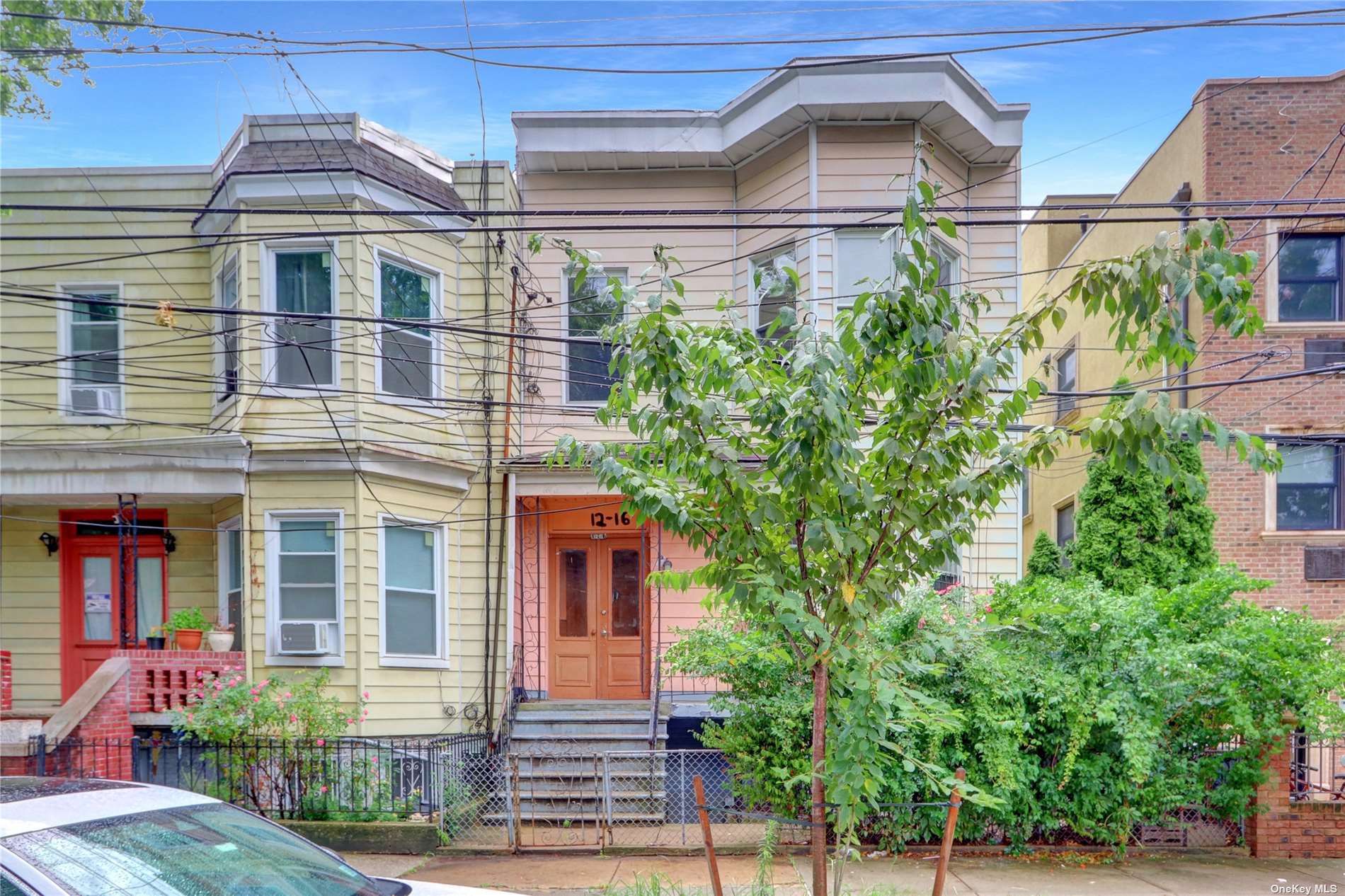 front view of a house with a street