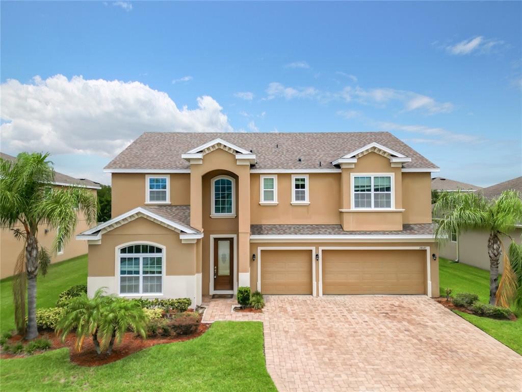 front view of a house with a yard