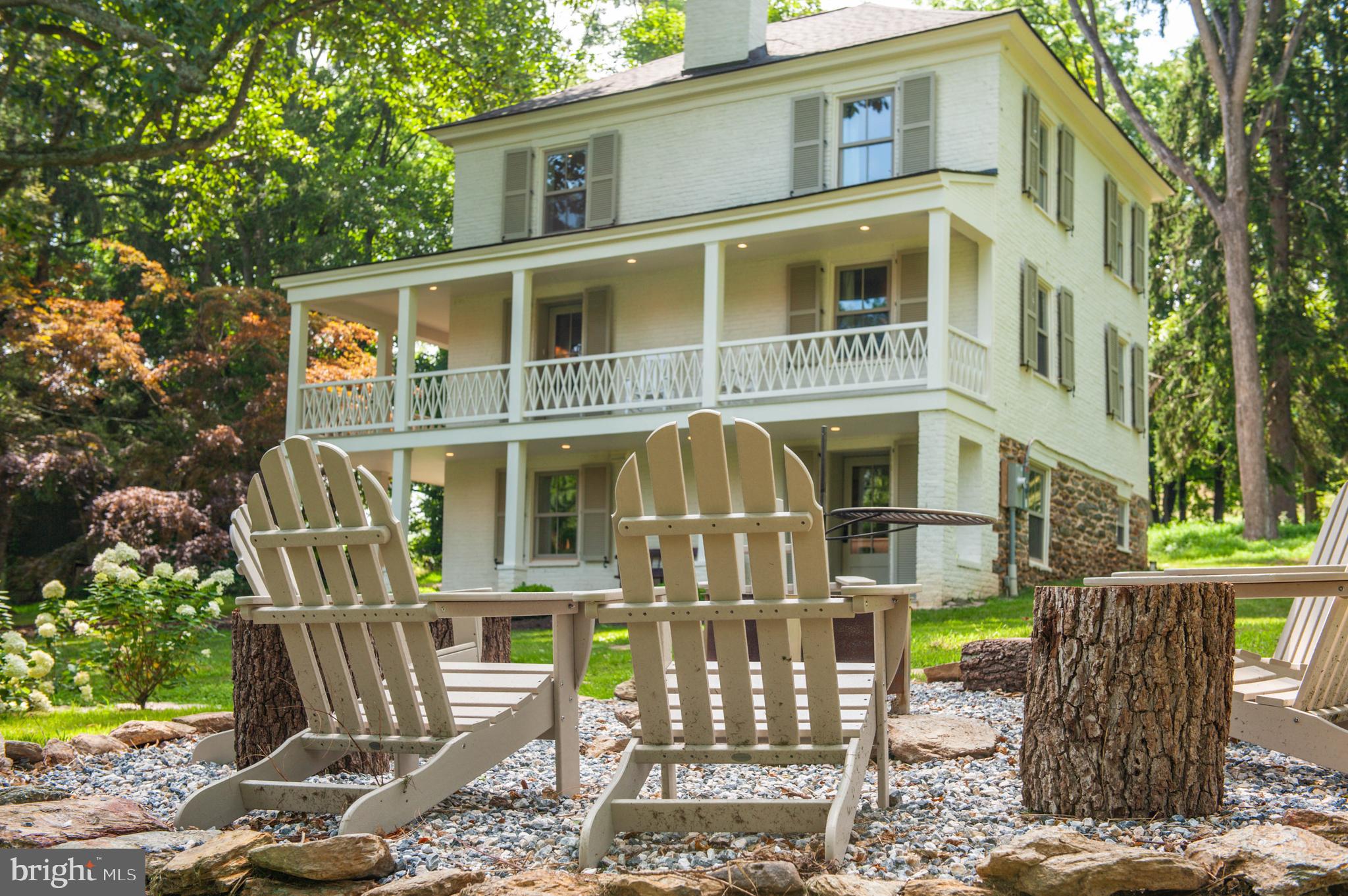 a front view of a house with a porch