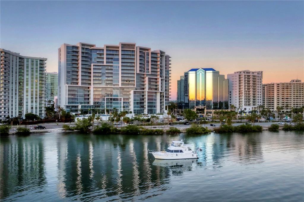 a view of a ocean with tall building