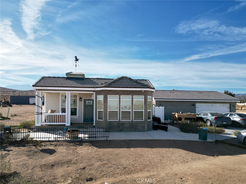 a view of a house with a patio