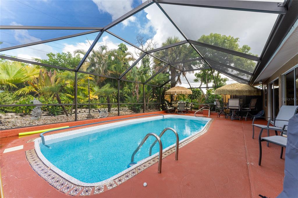 a view of a swimming pool with a porch