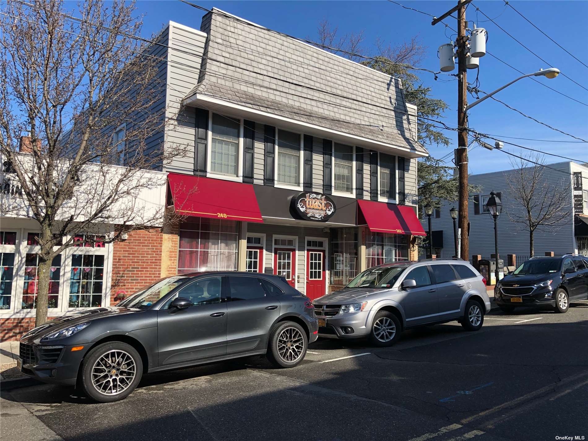 a car parked in front of a house