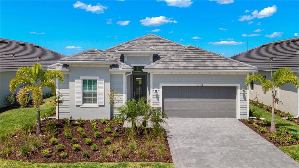 View of front of property with a garage