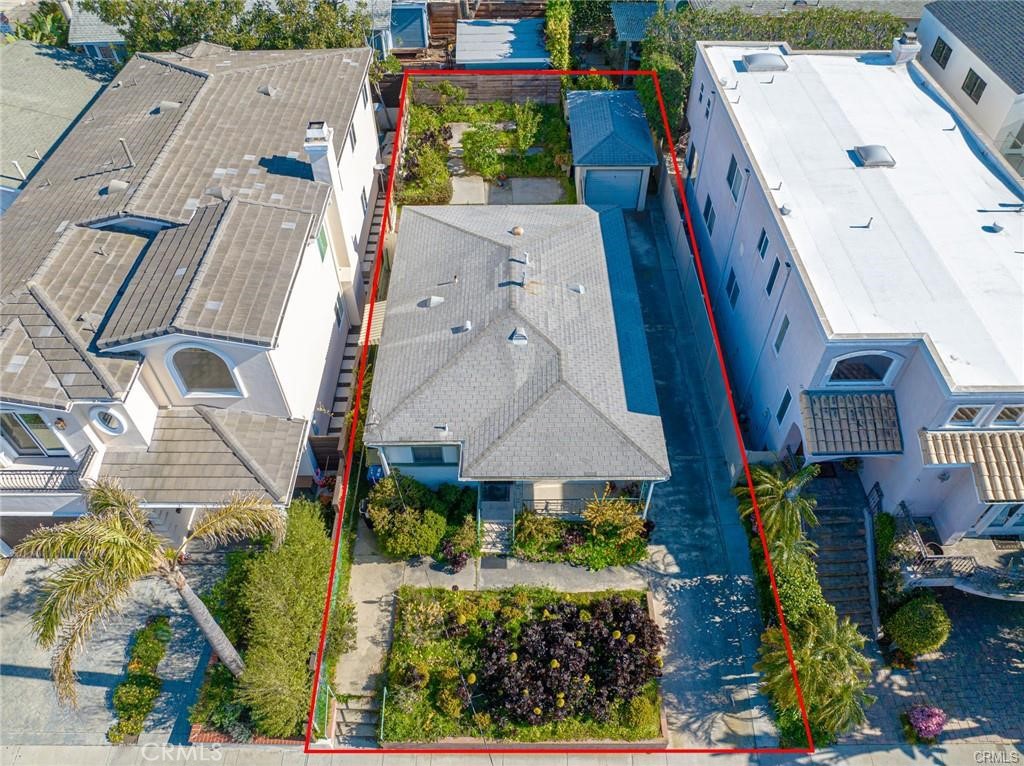 an aerial view of multiple houses with yard