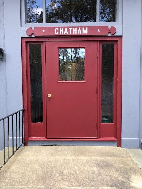 a view of a red door of the house